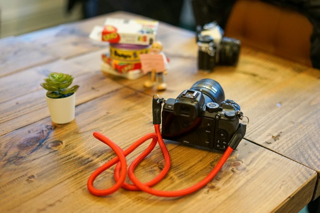 a camera sitting on top of a wooden table